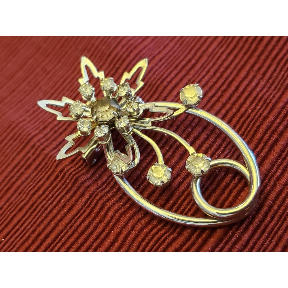 Vintage Unsigned White Rhinestone Star Over Oval Silver Color Brooch